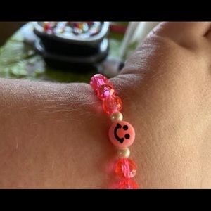 Pink Smiley face bracelet with pearls